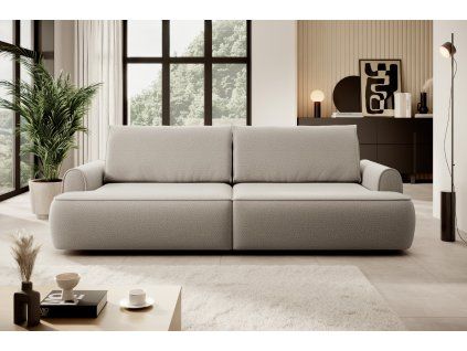 Rozkladacia pohovka CELTA SOFA v svetlom interiéri pri veľkom okne, béžové čalúnenie, pohľad spredu.
