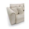 Rozkladacia pohovka SCANDORA XL SOFA detail bočnice, zvislé prešívanie na podrúčke a mäkké čalúnenie v svetlom odtieni.