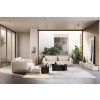 Modulárna sedacia súprava METROPIA R1 v modernom interiéri obývačky, svetlé čalúnenie s mäkkými vankúšmi a nízkym profilom, pohľad spredu.