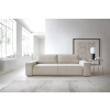 Rozkladacia pohovka FABIO SOFA v svetlom interiéri pri okne, béžové čalúnenie, pohľad v uhle spredu.