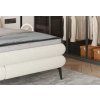 Boxspring posteľ - detail bočného rámu - krémové čalúnenie a tvarovanie