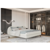 Boxspring posteľ RAIN - krémová čalúnená - v modernej spálni - celkový pohľad